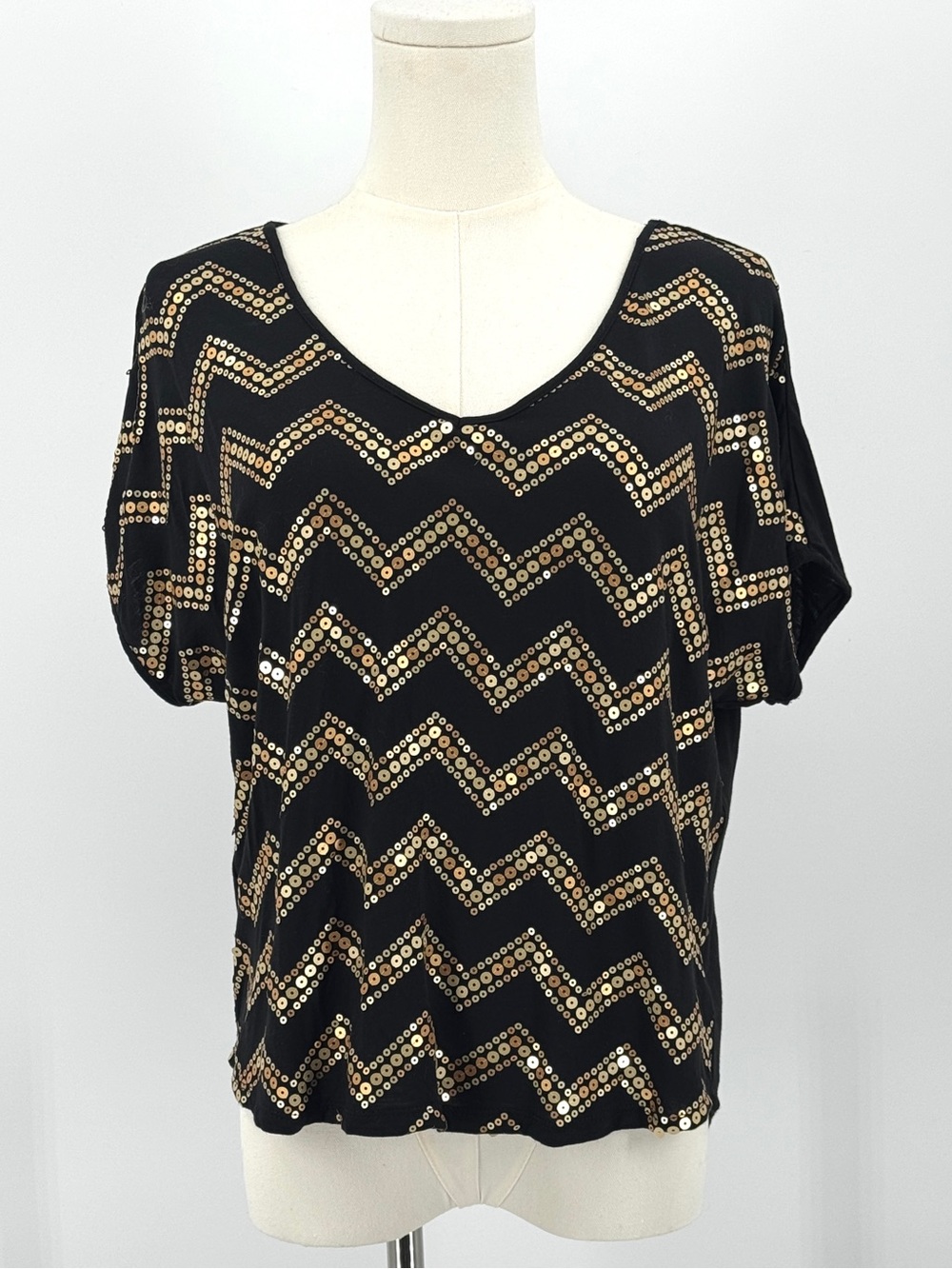 Black short sleeve top with gold sequins In chevron pattern